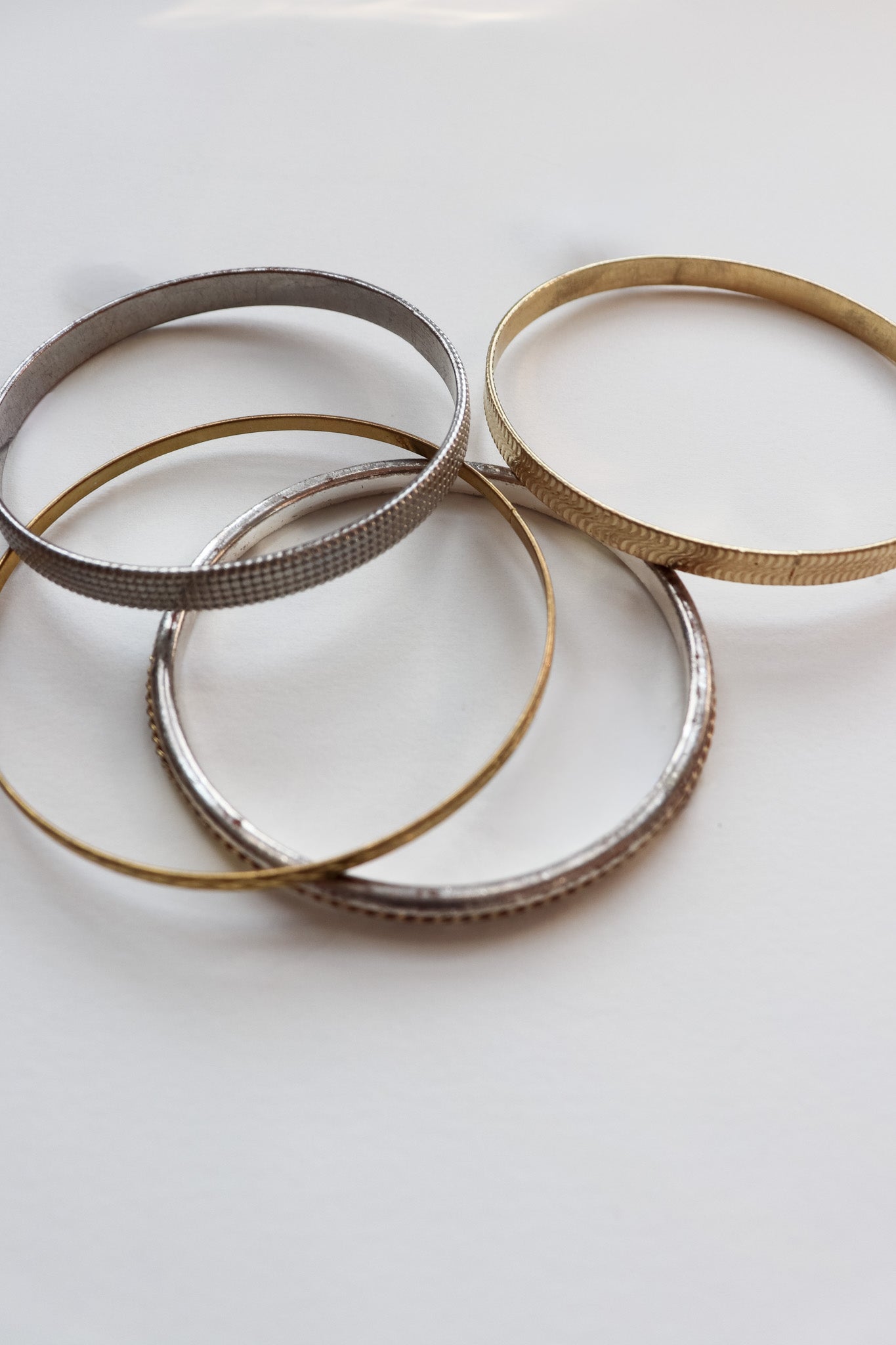 Vintage mixed metal bangle stack