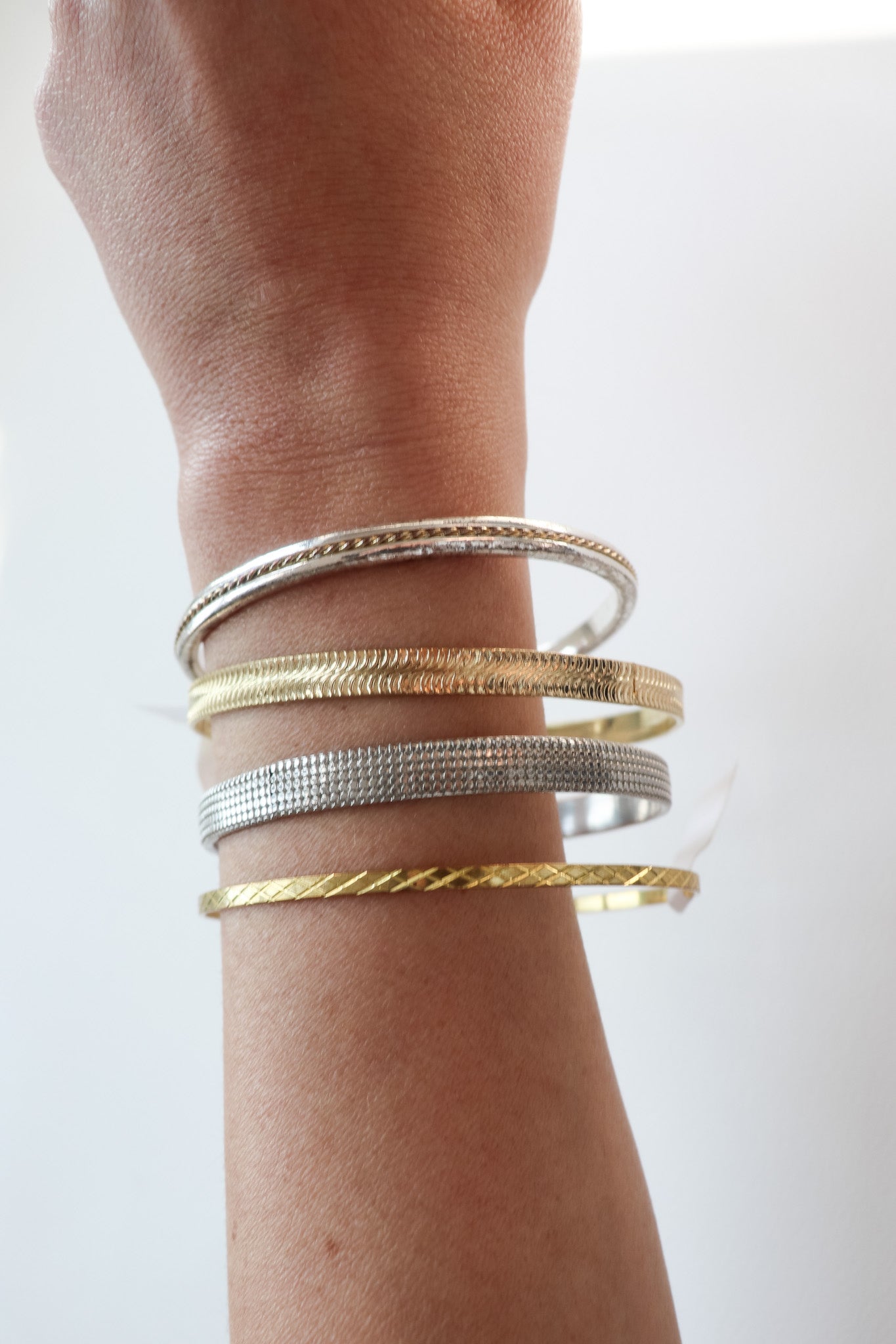 Vintage mixed metal bangle stack